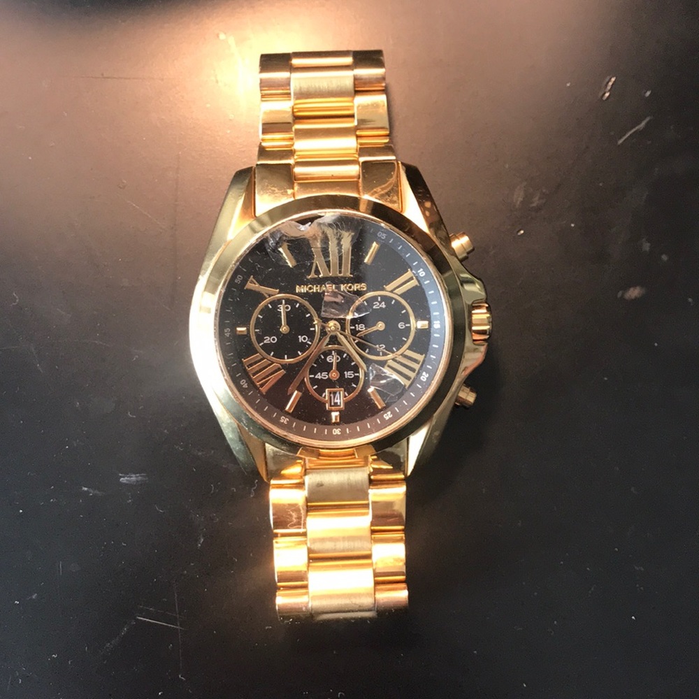 Men’s gold Michael Kors watch